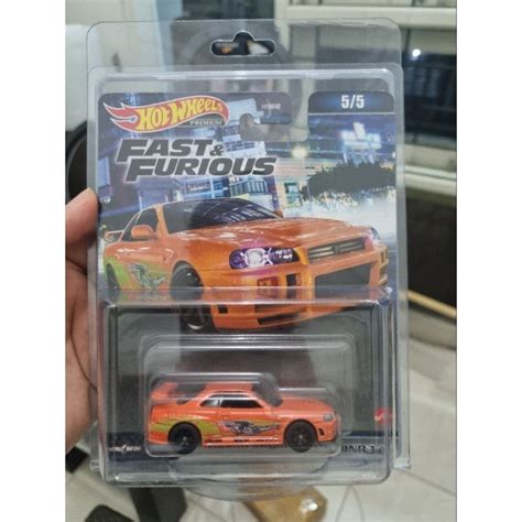 Jual HOT WHEELS PREMIUN NISSAN SKYLINE R34 ORANGE Shopee Indonesia