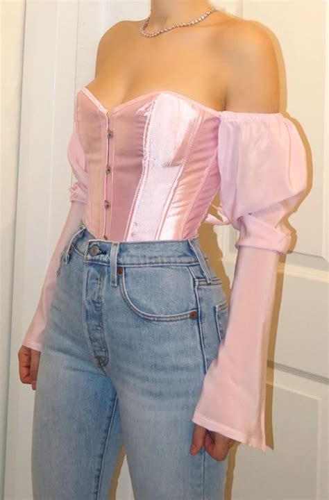 This Romantic Off Shoulder Bustier Top Is Made From A Satin Material