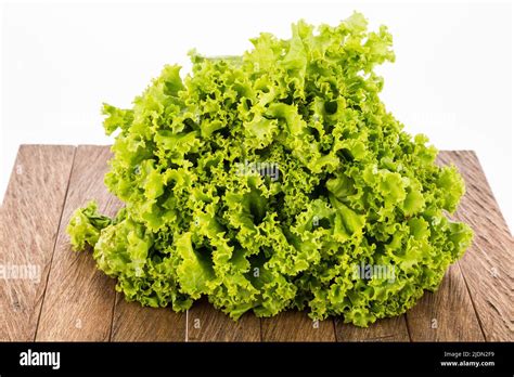 Crisp Lettuce On White Background Stock Photo Alamy