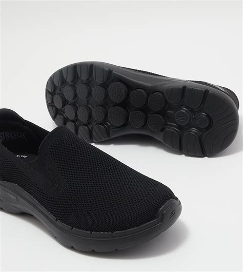 Buy Skechers GO WALK 6 Slip On Shoes In Black | 6thStreet UAE