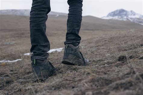 Man Walking on Hilly Terrain Stock Photo - Image of hiker, trail: 262473048