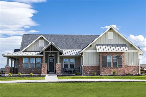 One Story Mountain Ranch Home Plan With Vaulted Den And 3 Car Garage