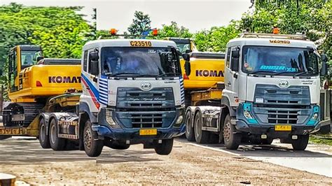 KONVOI TRUK JANGKUNG PT AAL UD QUESTER GWE 280 MUATAN EXCAVATOR