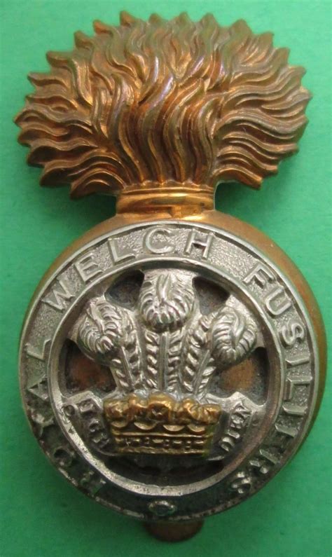 A ROYAL WELSH FUSILIERS CAP BADGE In Other Ranks