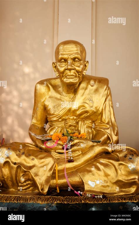 Gold Buddhist Monk Statue In Temple Stock Photo Alamy