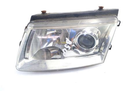 LAMPA REFLEKTOR LEWY PRZÓD VOLKSWAGEN PASSAT B5 11087126305