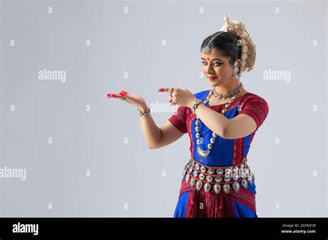 Odissi dancer striking a pose Stock Photo - Alamy