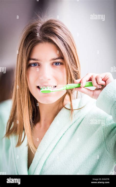 Woman Brushing Her Teeth With Toothbrush Stock Photo Alamy