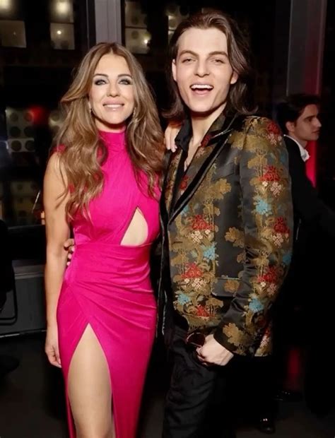 Liz Hurley 58 Sizzles In Boob Window Dress As Fans Swoon Over