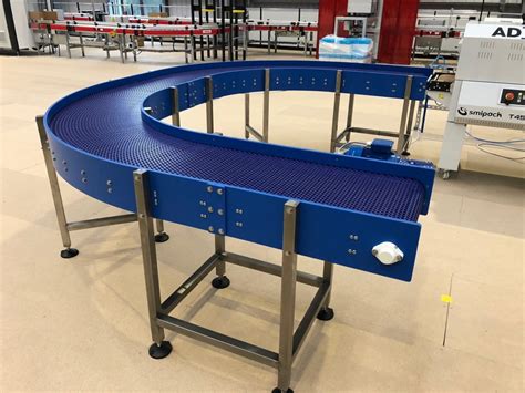 Radius Conveyors Carousel And Swan Neck Upm Conveyors