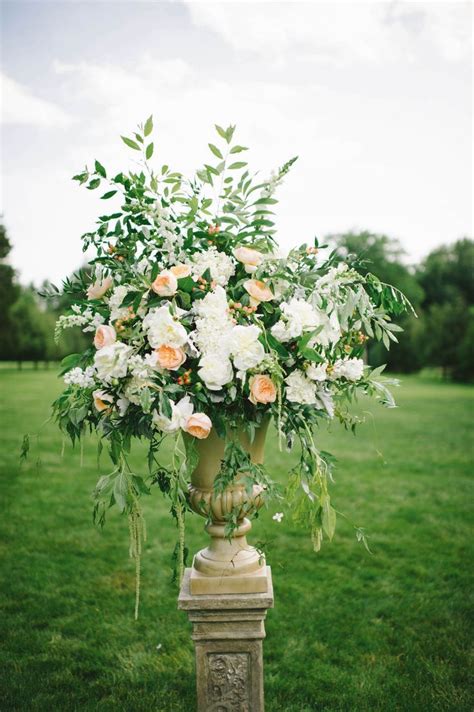 Large Urn Floral Arrangement Perfect For A Wedding Ceremony Greenery