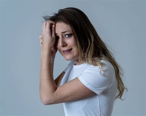 Portrait Of A Young Attractive Woman Looking Scared And Shockedhuman Expressions And Emotions