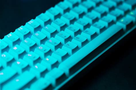 Free Photo | Blue keyboard with lights on desk