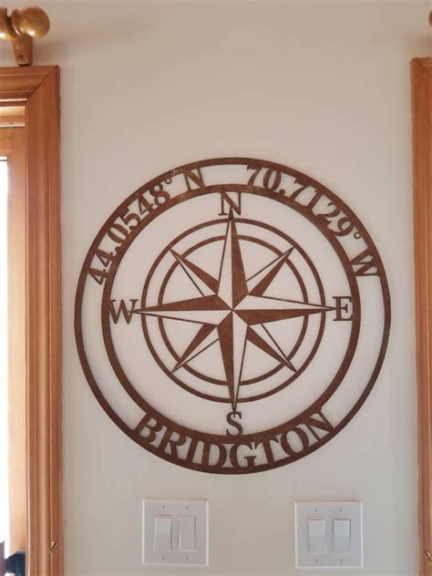 Metal Compass Rose With City And Coordinates