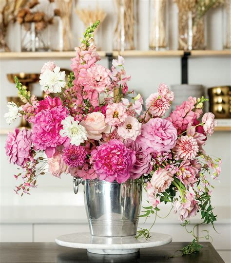 A Champagne Bucket Flower Arrangement - Flower Magazine 
