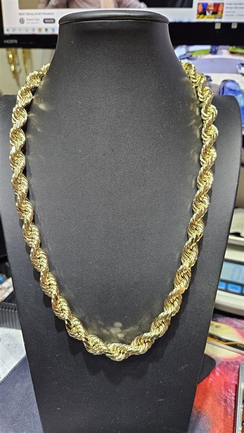 14K 12MM 24 1/2" DIAMOND CUT ROPE CHAIN (USED)