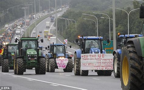 Dairy Farmer Drives Tractor At Police Outside Eu Headquarters In