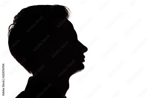 Silhouette Of An Unrecognizable Guy Man Face Profile On A White