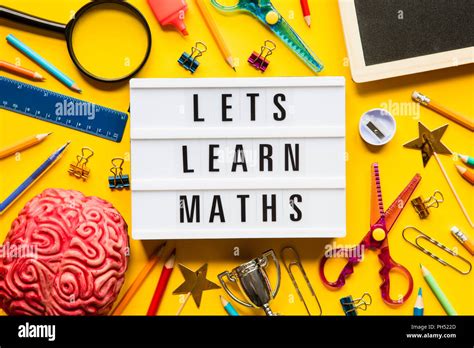 Lets Learn Maths Lightbox Message On A Bright Yellow Background Stock