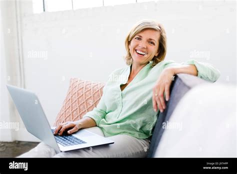 Portrait Of Mature Woman Using Computer Stock Photo Alamy
