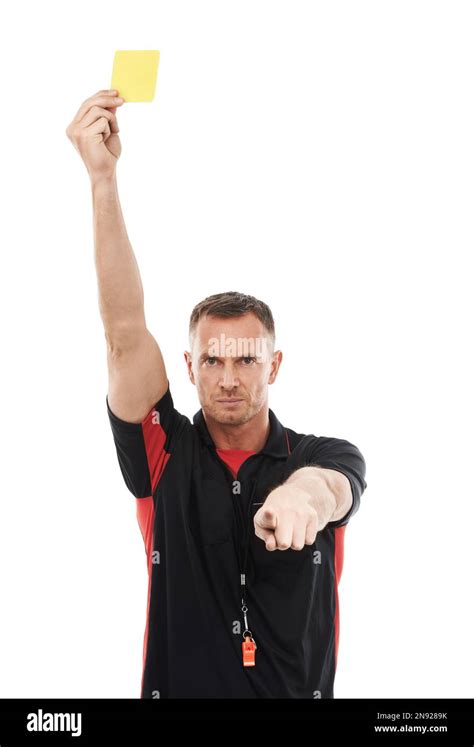 Portrait Foul And Yellow Card With A Soccer Referee In Studio Isolated