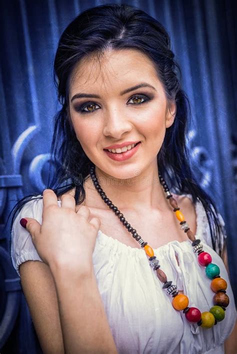 Beautiful Brunette Girl With Big Eyes And White Dress Smiling N Stock Image Image Of Purple