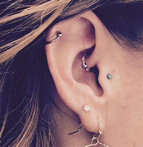 Daith Tragus And Helix Piercing Ear Piercings Piercings Helix