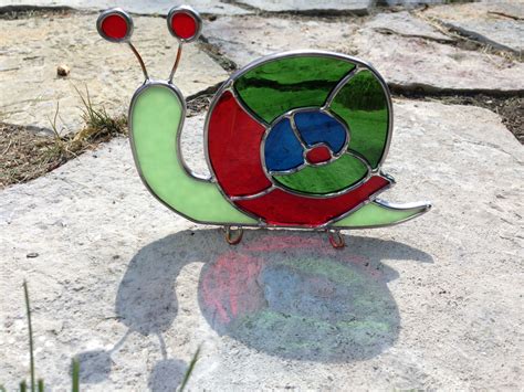 stained glass snail | Faux stained glass, Stained glass suncatchers, Stained glass designs