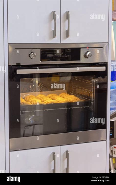 Baking Croissants At Tray In Electric Oven Home Cooking Stock Photo Alamy