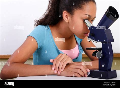 A Student Using A Microscope Stock Photo Alamy