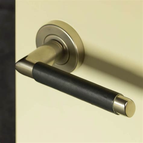 Turnstyle Design Door Handle Tan Leather Polished Nickel Model