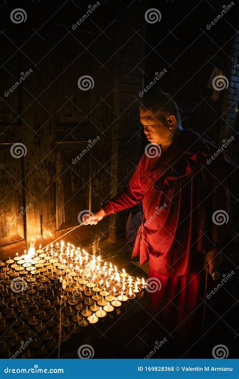 Buddhist Monk Lights A Candle Editorial Stock Photo Image Of Culture