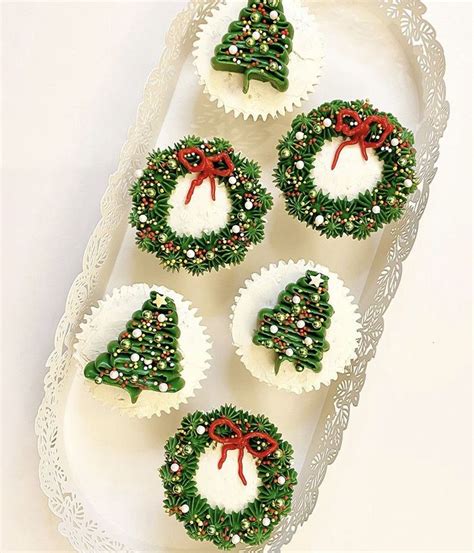 Christmas Cupcakes Decorated With Green And Red Decorations