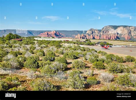 Aerial View Of Sedona Airport Runway Amidst Red Rock Formations Stock