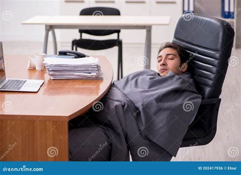 Young Male Employee Sleeping In The Office Stock Photo Image Of