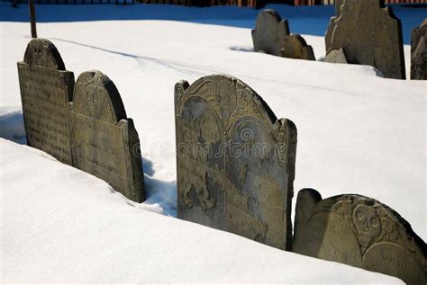 Tombstones in winter editorial stock image. Image of gravestone - 300111799