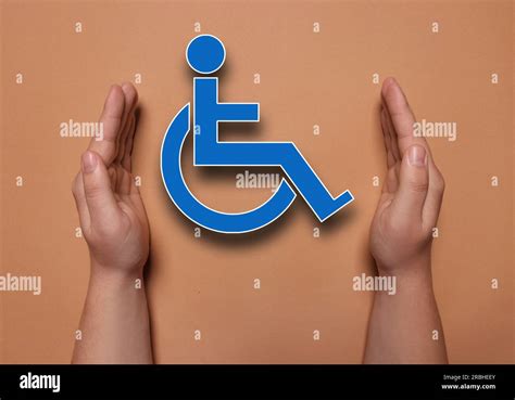 Disability Inclusion Woman Protecting Wheelchair Symbol On Coral