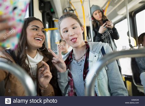 Teenage Girl Making A Face Taking Selfie Bus Stock Photo Alamy