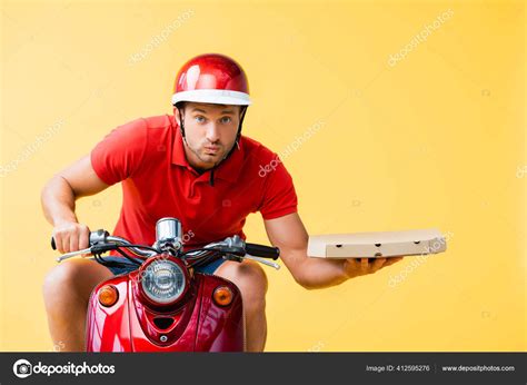 Concentrated Delivery Man Helmet Riding Red Scooter Holding Pizza Box ...