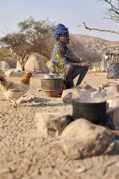 Old Mucubal Tribe Woman And Her Cooking Pots Tchitundo Hulo Virei