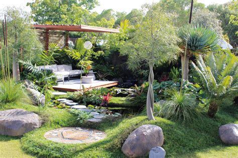 A Luxuriant Resort Style Garden With Lagoons And A Waterfall Feature