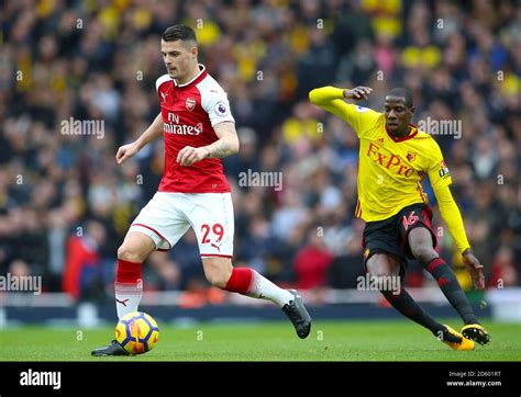 Arsenal S Granit Xhaka Left And Watford S Abdoulaye Doucoure In