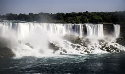 Silky Waters Of American Falls Flowing Down From The Top As Soon From