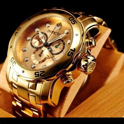 Ripley RELOJ INVICTA HOMBRE IN0074 PRO DIVER 74 CRONÓMETRO FECHA DORADO