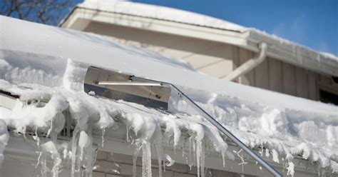 How To Safely Remove Snow From Your Roof