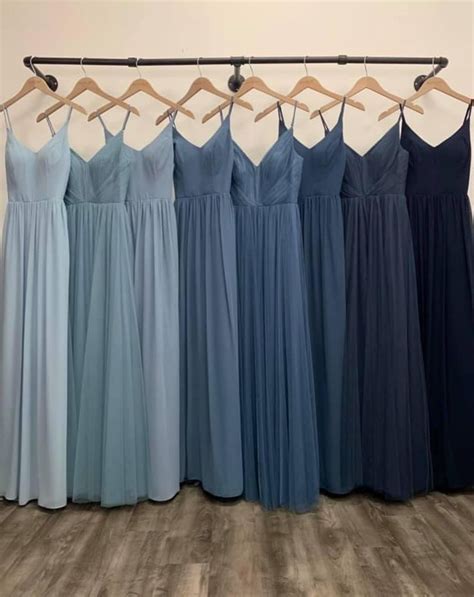 The Bridesmaids Are Lined Up In Their Dresses