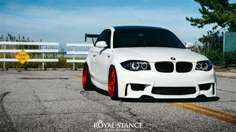 Neck-Breaking White Lowered BMW 1-Series on Candy Red Rims — CARiD.com ...