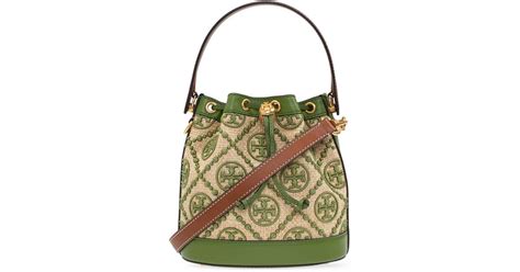 Tory Burch T Monogram Straw Bucket Bag In Green Lyst Australia