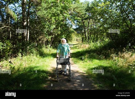 Woman Walking Frame Hi Res Stock Photography And Images Alamy