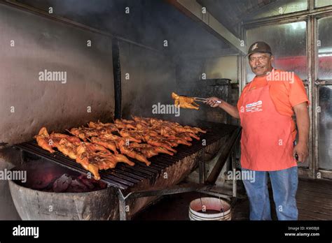 Man Cooking Bbq Chicken Over Coals Chapala Jalisco Mexico Stock